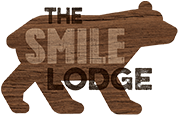 The Smile Lodge Logo