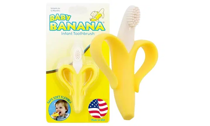Baby banana teething toy in yellow with packaging featuring infant and American flag on white background.