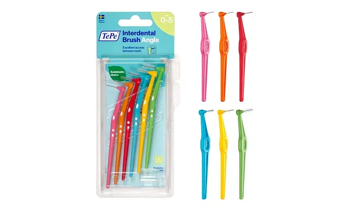 Colorful toothbrushes in packaging displayed with product examples showing bristle varieties and colors.