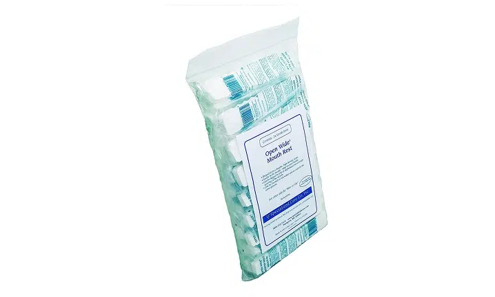 Packaged facial cleansing wipes with green and white branding displayed at an angle.
