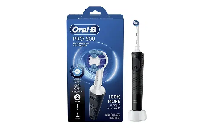 Oral-B electric toothbrush with black handle displayed in blue packaging box.