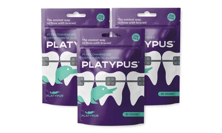 Three purple Platypus product pouches displayed against white background packaging.