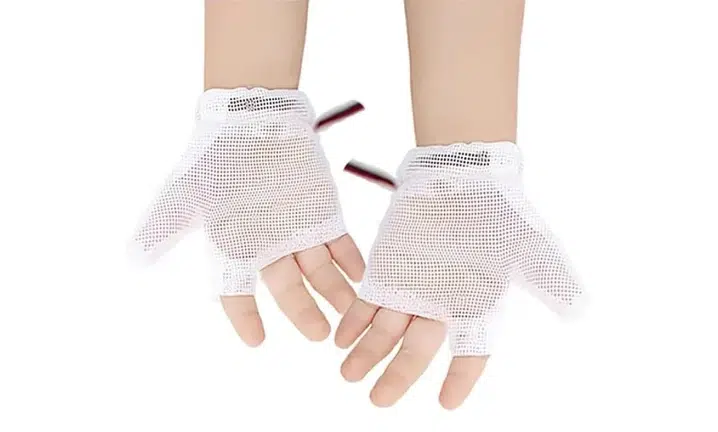 Person wearing white fingerless gloves with textured knit pattern, hands positioned together.